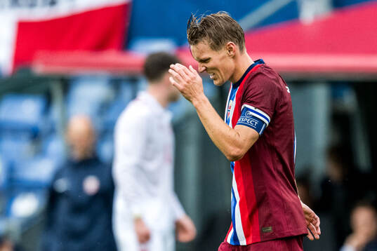 Martin Ødegaard of Norway looks dejected