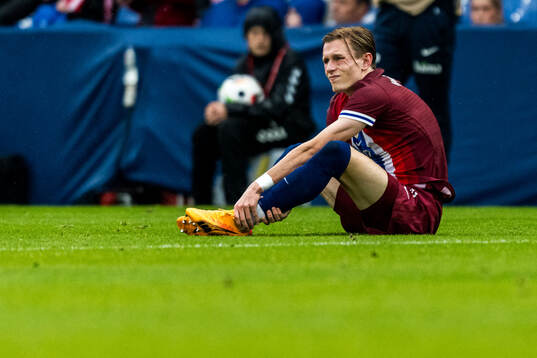 Sander Berge of Norway in pain