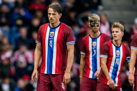 Sander Berge of Norway looks dejected