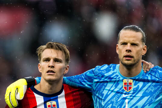 Martin Ødegaard and goalkeeper Ørjan Håskjold Nyland of