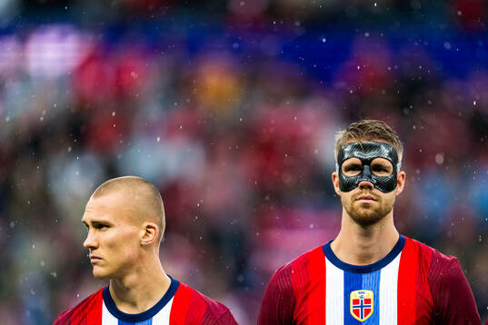 Leo Østigård and Kristoffer Ajer of Norway