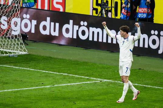 Dusan Vlahovic of Serbia celebrates