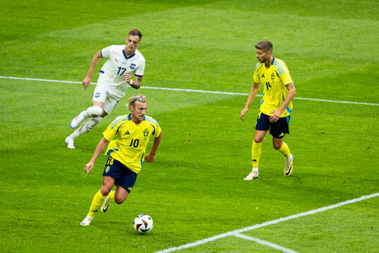 Emil Forsberg and Anton Salétros of Sweden against Ivan