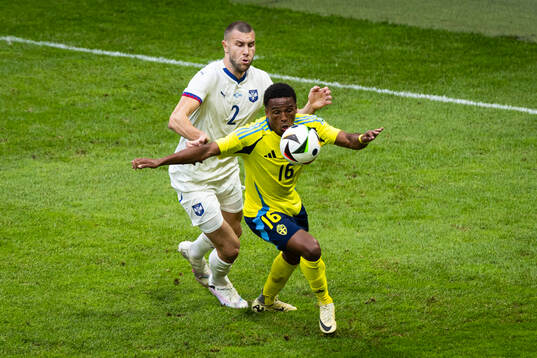 Niclas Eliasson of Sweden against Strahinja Pavlovic of