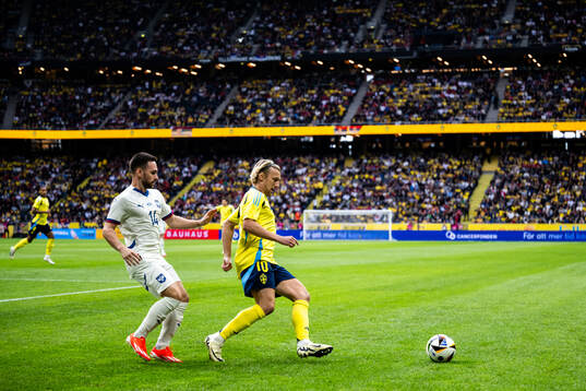 Andrija Živkovic of Serbia and Emil Forsberg of Sweden