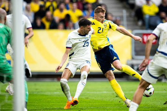 Filip Mladenovic of Serbia and Dejan Kulusevski of Sweden