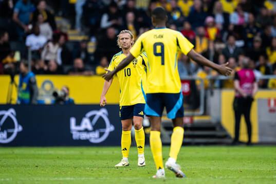 Emil Forsberg and Alexander Isak of Sweden looks dejected