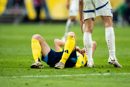 Dejan Kulusevski of Sweden in pain