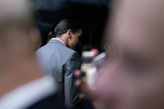 Zlatan Ibrahimović leaves a ceremony to honor his career