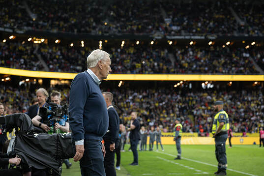 Tommy Söderberg enters the pitch at a ceremony to honor
