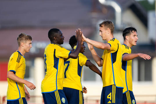 Imam Jagne and Jesper Tolinsson of Sweden celebrate