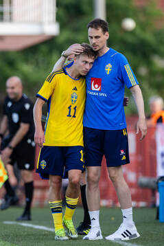 Hugo Bolin and Head coach Daniel Bäckström of Sweden