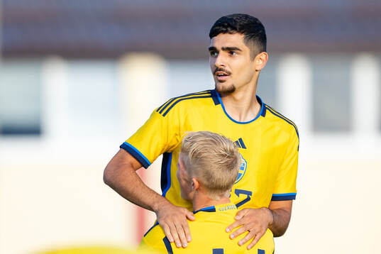 Aimar Sher of Sweden celebrates