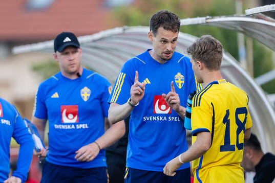 Head coach Daniel Bäckström and Wilmer Odefalk  of Sweden