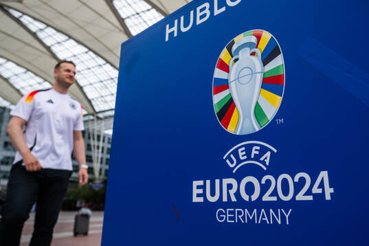 The logo for the tournament is seen