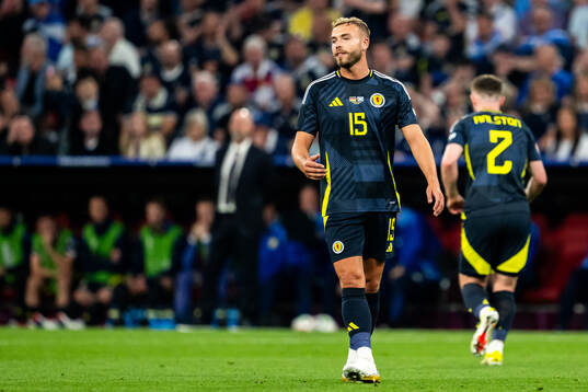 Ryan Porteous of Scotland looks dejected