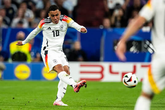 Jamal Musiala of Germany scores the 2-0 goal