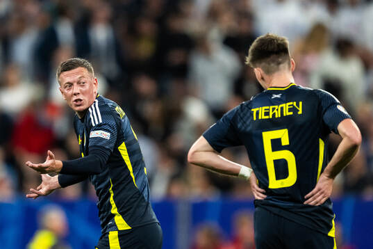 Callum McGregor and Kieran Tierney of Scotland look dejected