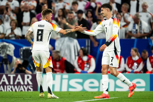 Kai Havertz of Germany celebrate with Toni Kroos