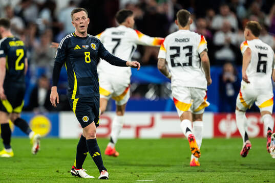 Callum McGregor of Scotland looks dejected