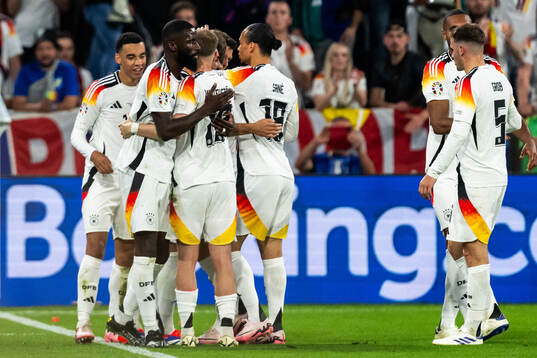 Niclas Füllkrug of Germany celebrate with teammates