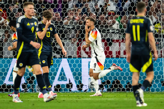 Niclas Füllkrug of Germany celebrate