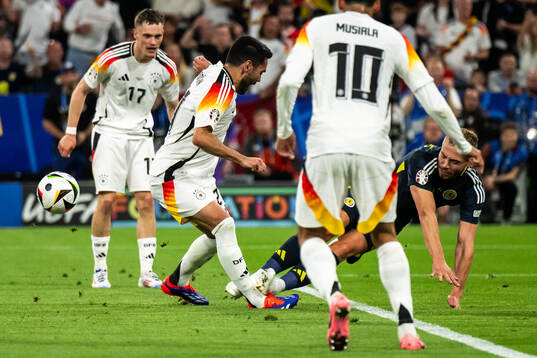 Ilkay Gündogan of Germany and Ryan Porteous of Scotland