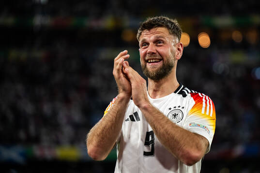 Niclas Füllkrug of Germany celebrates