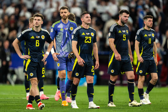 Kieran Tierney, Angus Gunn, Kenny McLean, Grant Hanley, and