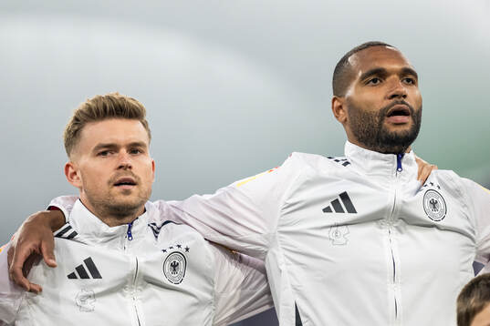 Maximilian Mittelstädt and Jonathan Tah of Germany
