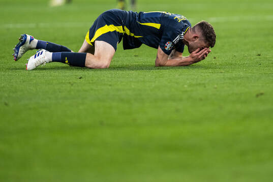 Ryan Christie of Scotland in pain
