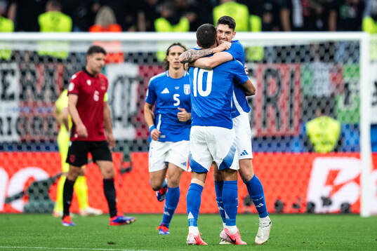 Alessandro Bastoni of Italy celebrates with Lorenzo