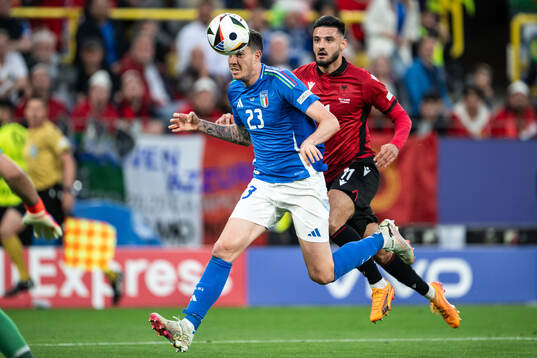 Alessandro Bastoni of Italy and Armando Broja of Albania