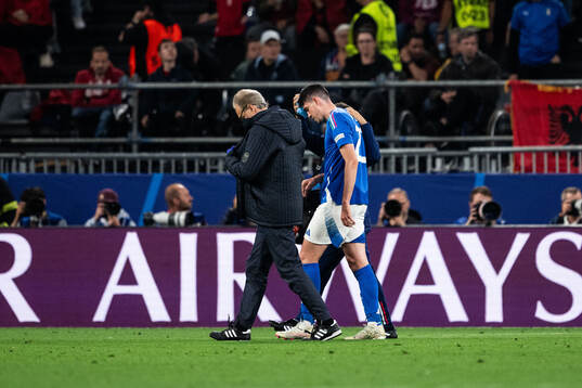 Alessandro Bastoni of Italy in pain
