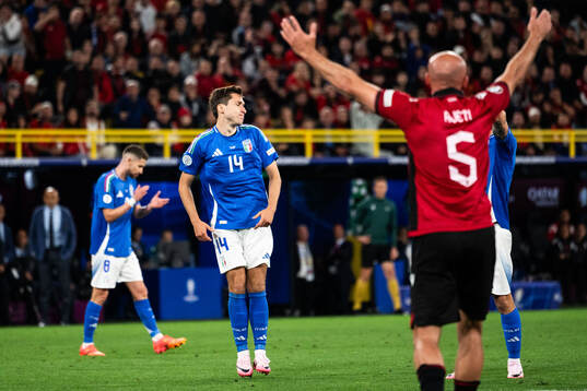 Federico Chiesa of Italy looks dejected