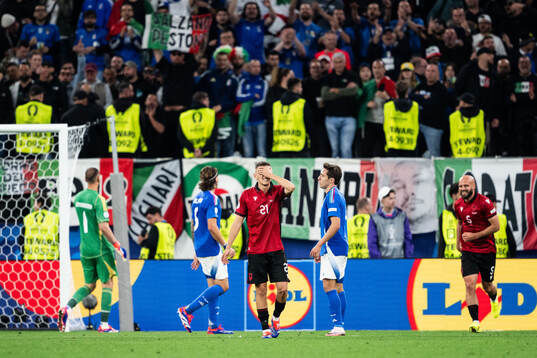 Kristjan Asllani of Albania looks dejected