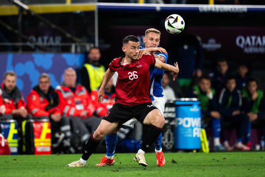 Arber Hoxha of Albania and Davide Frattesi of Italy