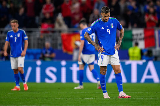 Gianluca Scamacca of Italy looks dejected