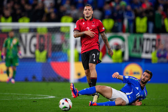 Rey Manaj of Albania and Bryan Cristante of Italy