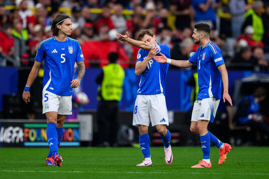 Nicolo Barella of Italy celebrate with teammates