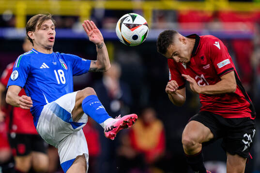 Nicolo Barella of Italy and Kristjan Asllani of Albania