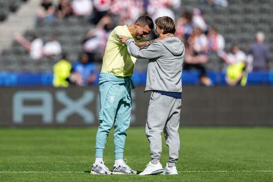 Joselu of Spain and Luka Modric of Croatia