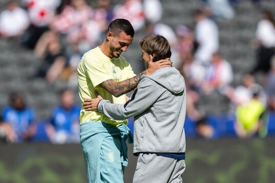 Joselu of Spain and Luka Modric of Croatia