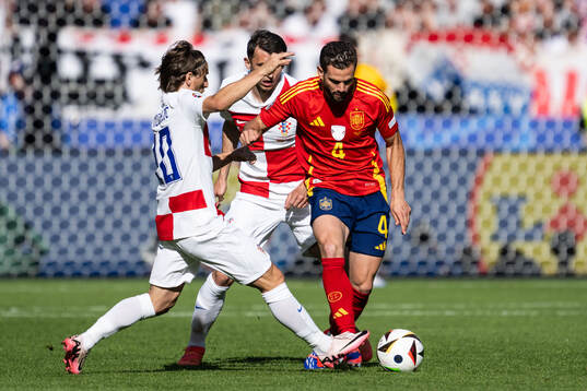 Luka Modric of Croatia and Nacho of Spain