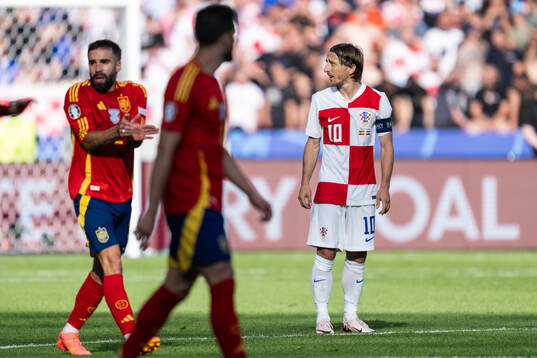 Luka Modric of Croatia looks dejected