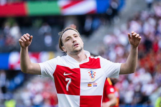 Lovro Majer of Croatia looks dejected