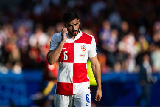 Josip Sutalo of Croatia looks dejected