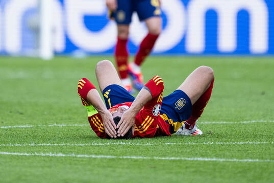 Alvaro Morata of Spain in pain