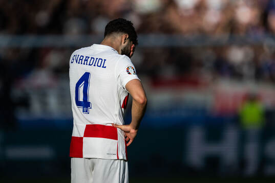 Josko Gvardiol of Croatia looks dejected