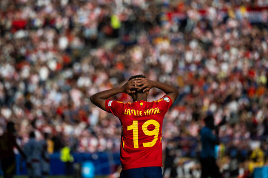 Lamine Yamal of Spain looks dejected